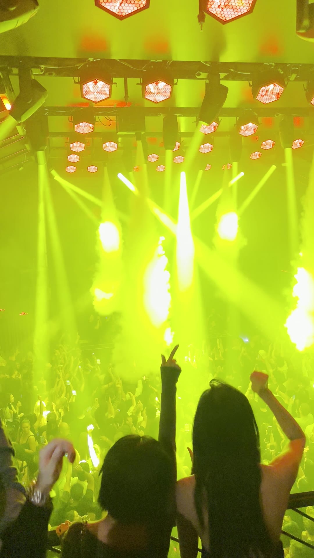 Bottle service arriving on a packed New York dance floor